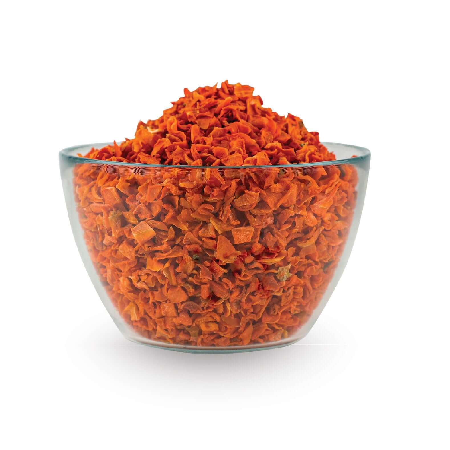 Glass bowl of Gold Tree Organics dried carrots for horses in bright orange bite sized horse licks